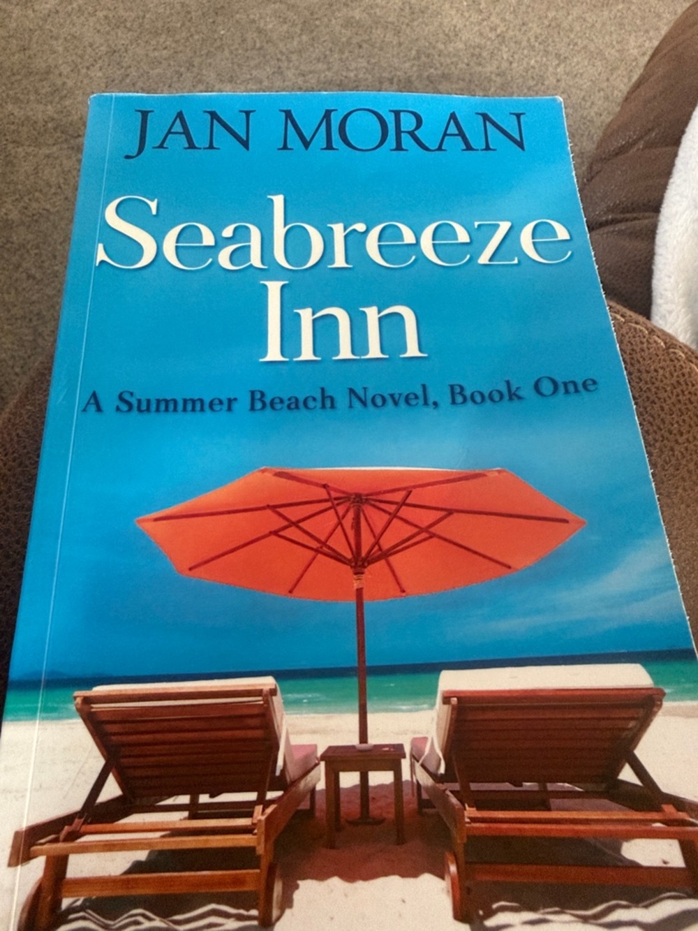 Jan Moran Seabreeze Inn Paperback Novel - Bright Blue Cover with Orange Umbrella